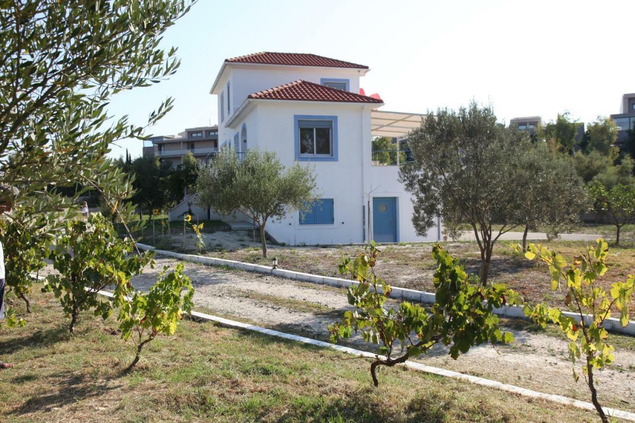 Romanos XI Xi Beach Exterior foto